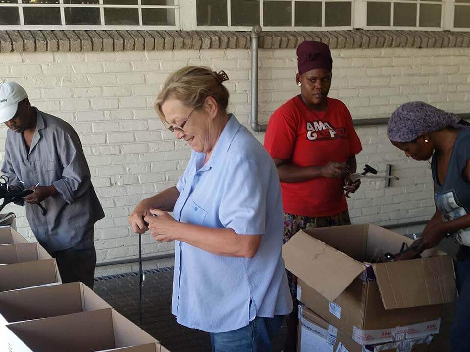 Job Creation Staff learning to sort hangers